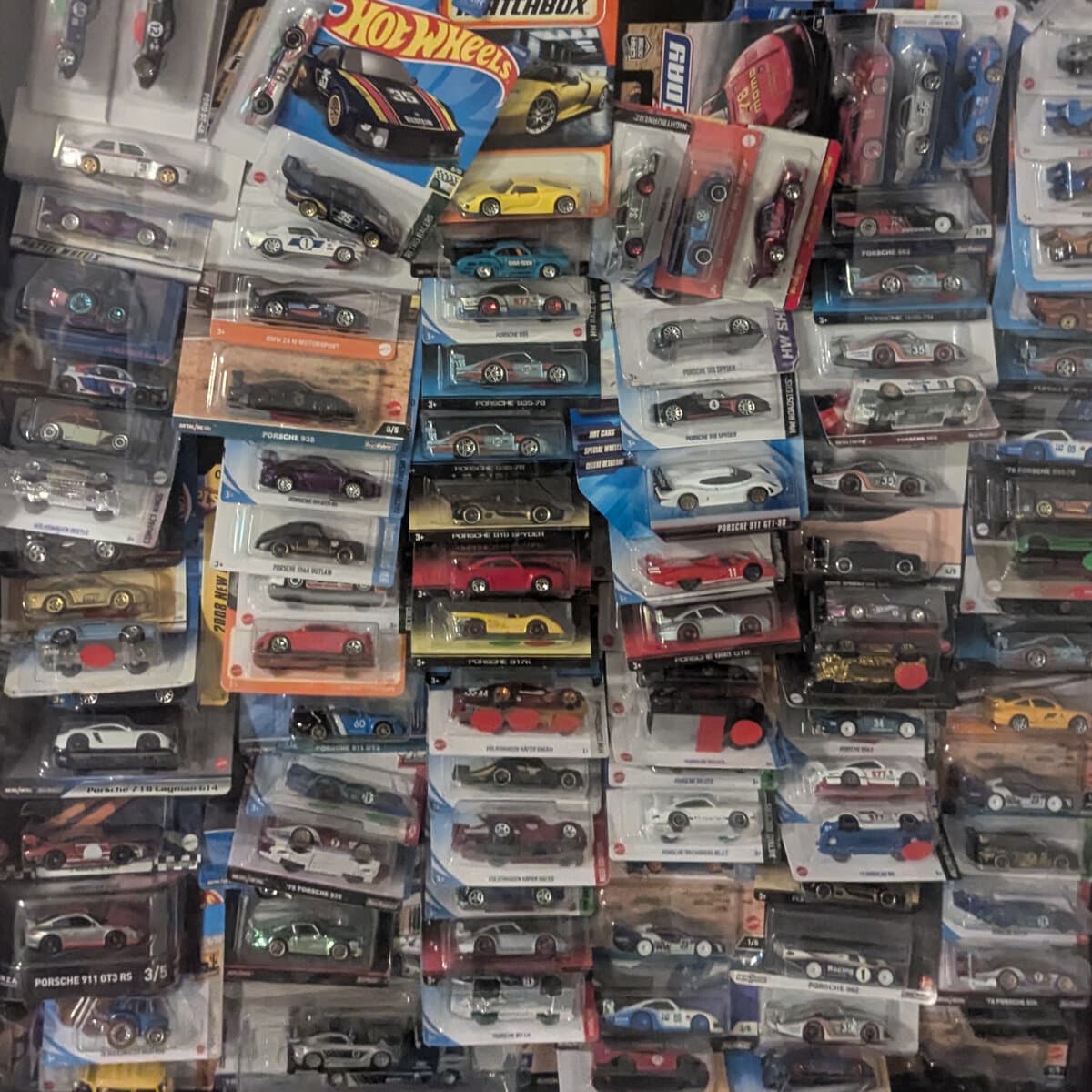 Hot Wheels collection piled messily